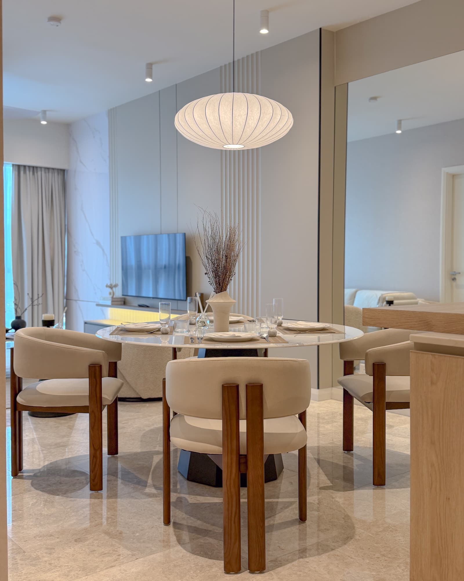 Modern Minimalist Wabi Sabi Dining Room in TRX Residences with Cozy Furnishings